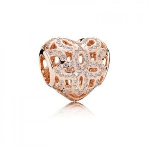 Pandora Rose gold open work hand charm